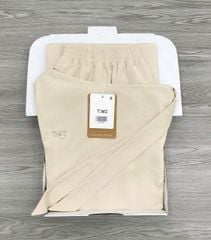 KS1229 - SET ÁO LỆCH VAI NƠ, CHÂN VÁY DÀI (KEM)