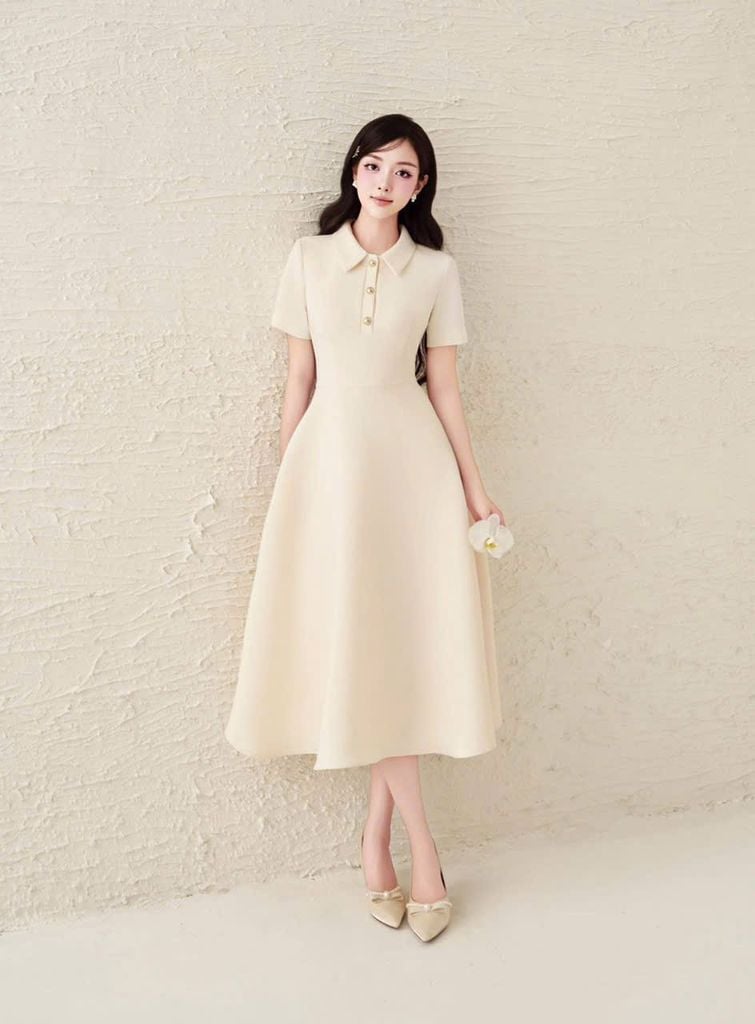 TB5813 ĐẦM SƠ MI ĐÍNH NÚT (KEM)