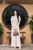 Áo croptop kem thanh xuân SM1105