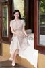 Đầm thô hoa nhí nơ hông DL1104