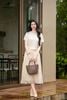 Áo croptop linen kem SM1084