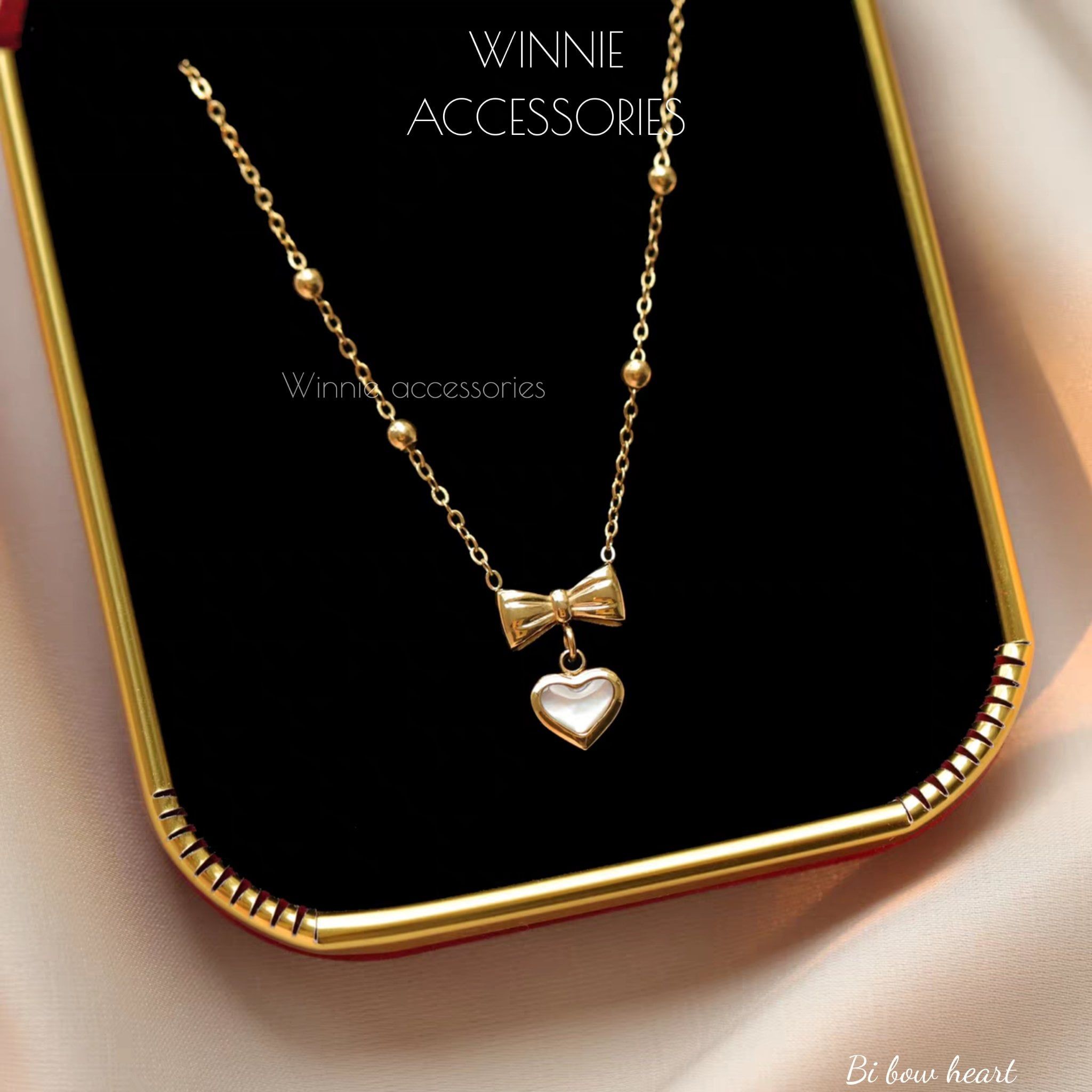  Dây chuyền Titan Bi Bow Heart 