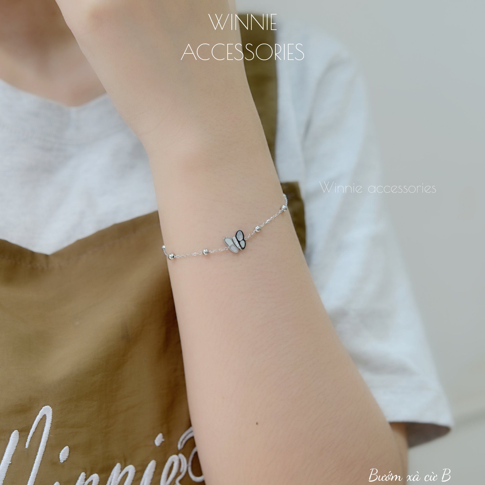  Lắc tay Titan Bướm xà cừ B 