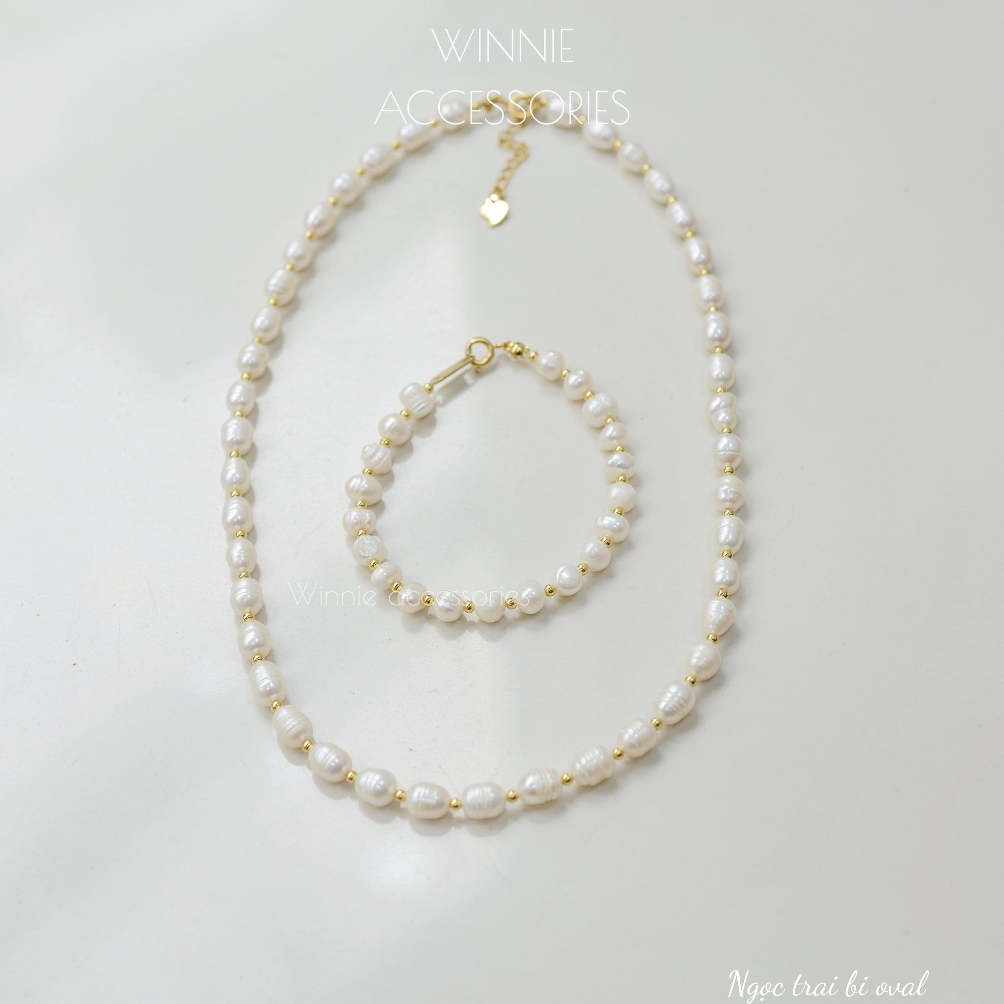  Lắc tay Titan Ngọc trai Bi Oval (ngọc trai nước ngọt) 