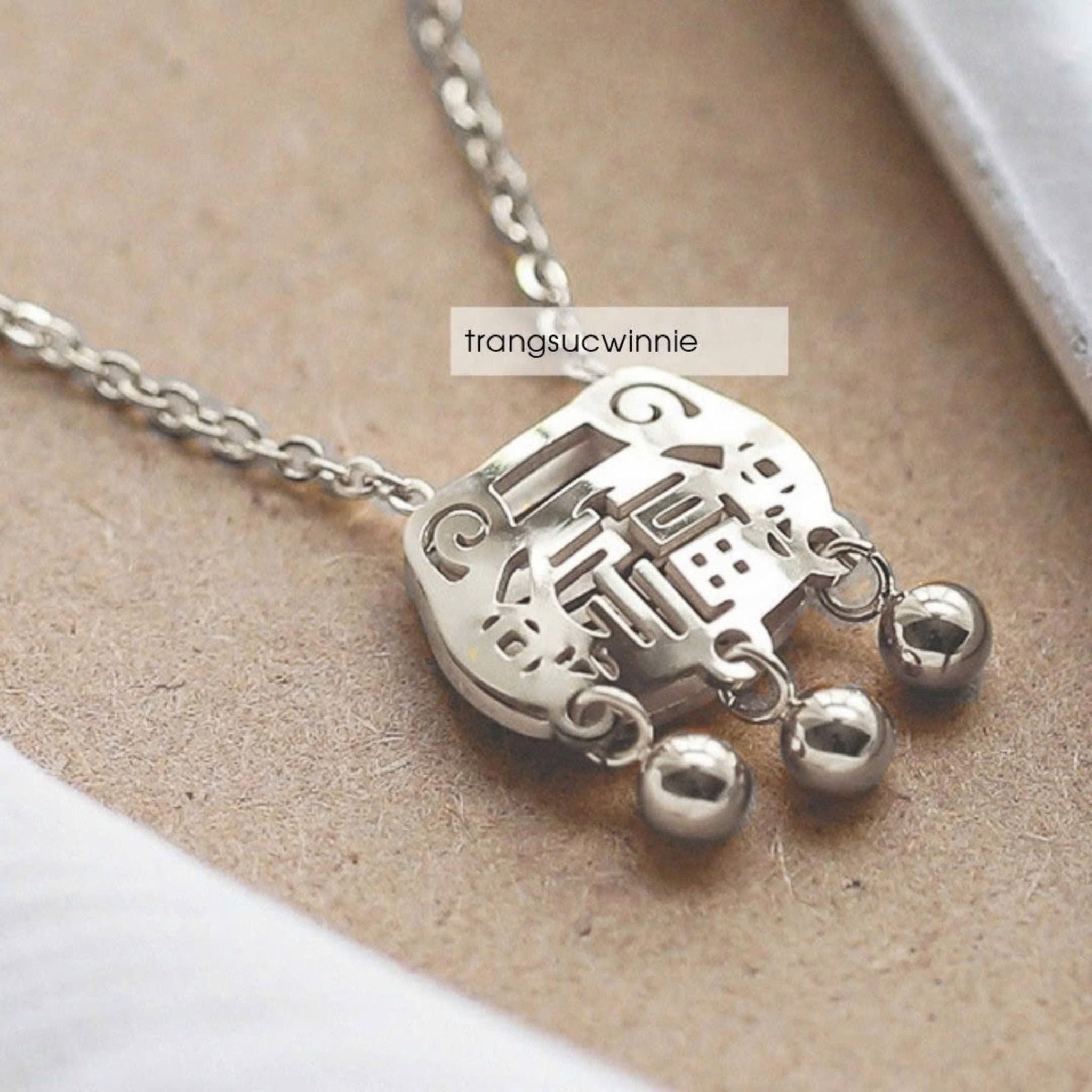  Dây chuyền Titan Bách gia tỏa 