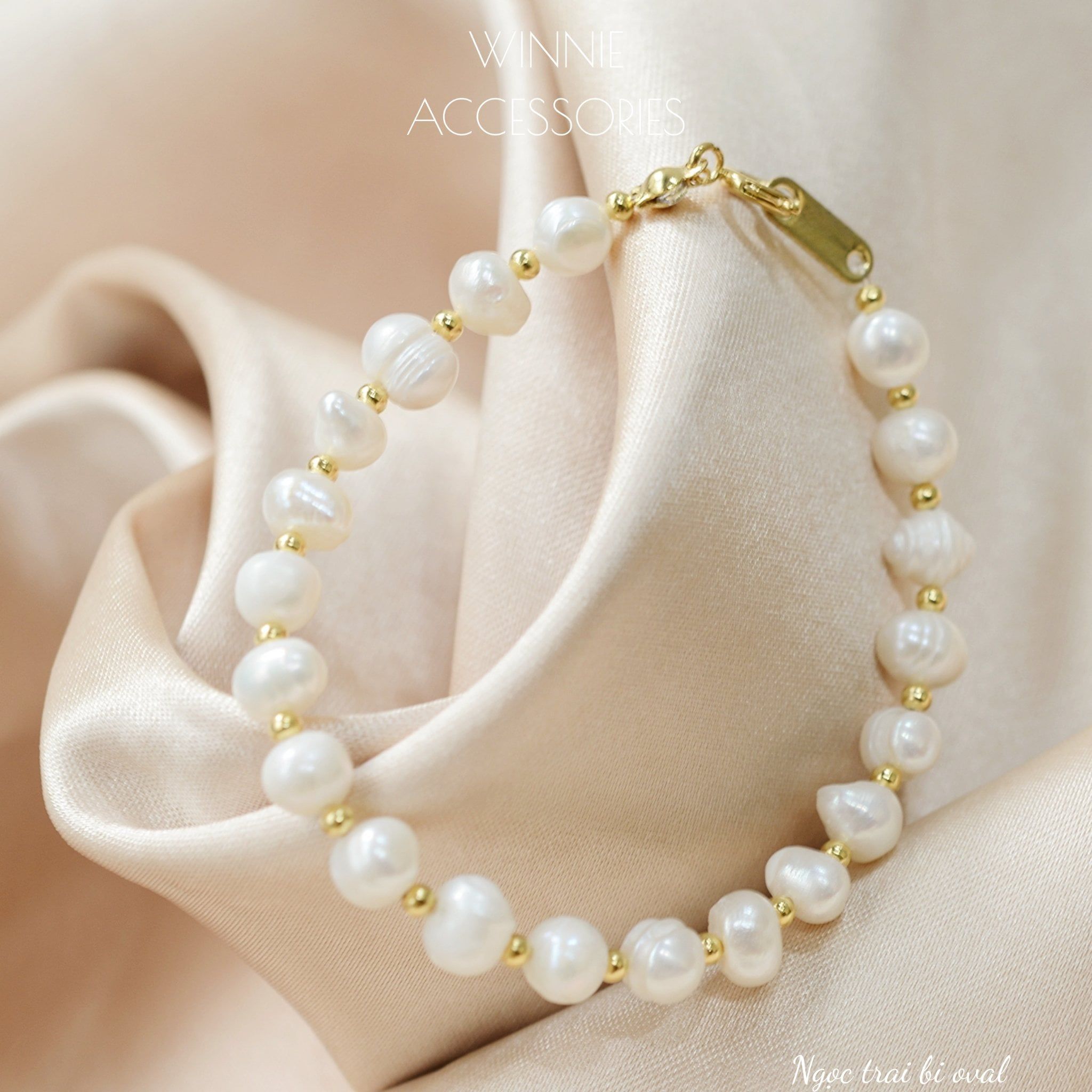  Lắc tay Titan Ngọc trai Bi Oval (ngọc trai nước ngọt) 