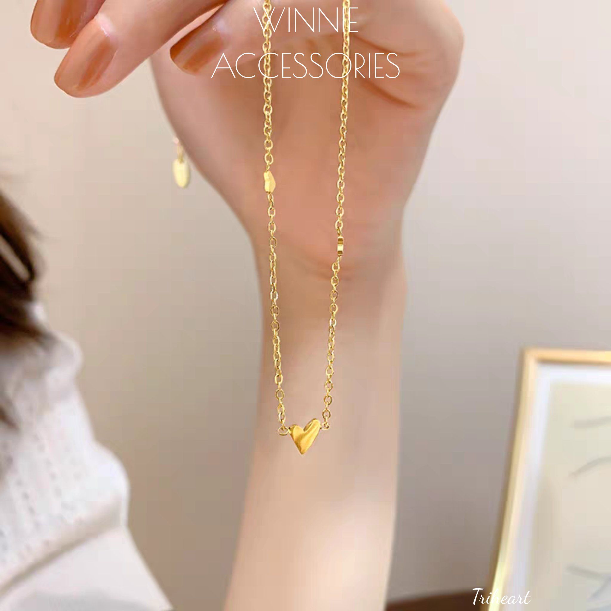  Dây chuyền titan Triheart 