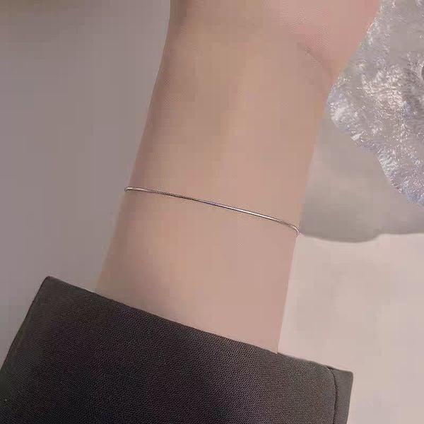  Lắc tay titan trơn mảnh B 