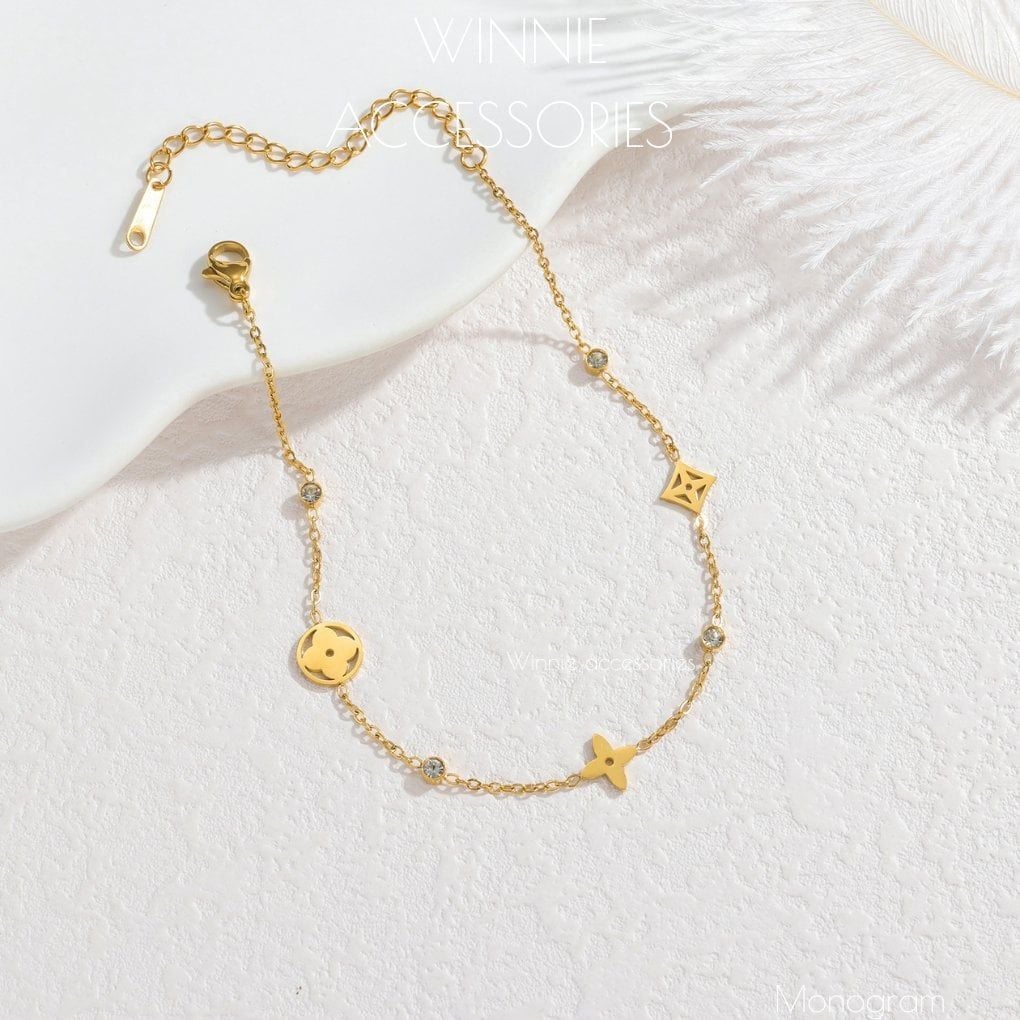  Lắc tay Titan Monogram 