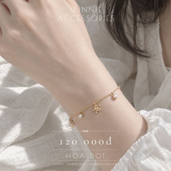  Lắc tay Titan Hoa Dot VG 