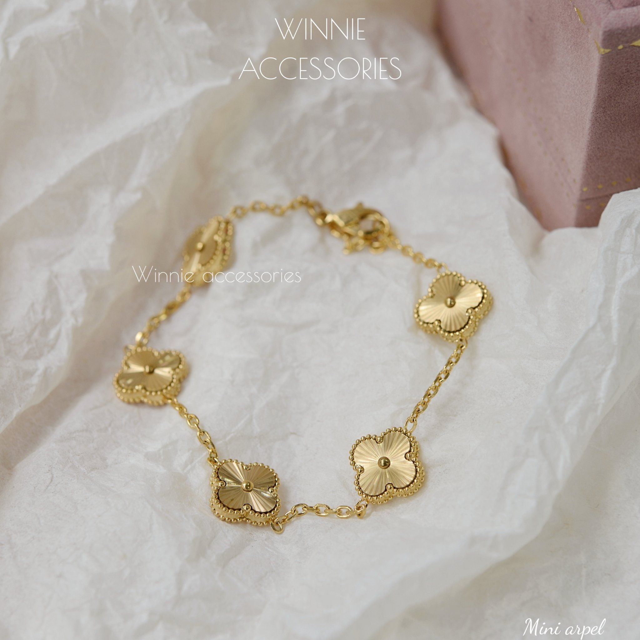  Lắc tay Titan Mini Arpel 