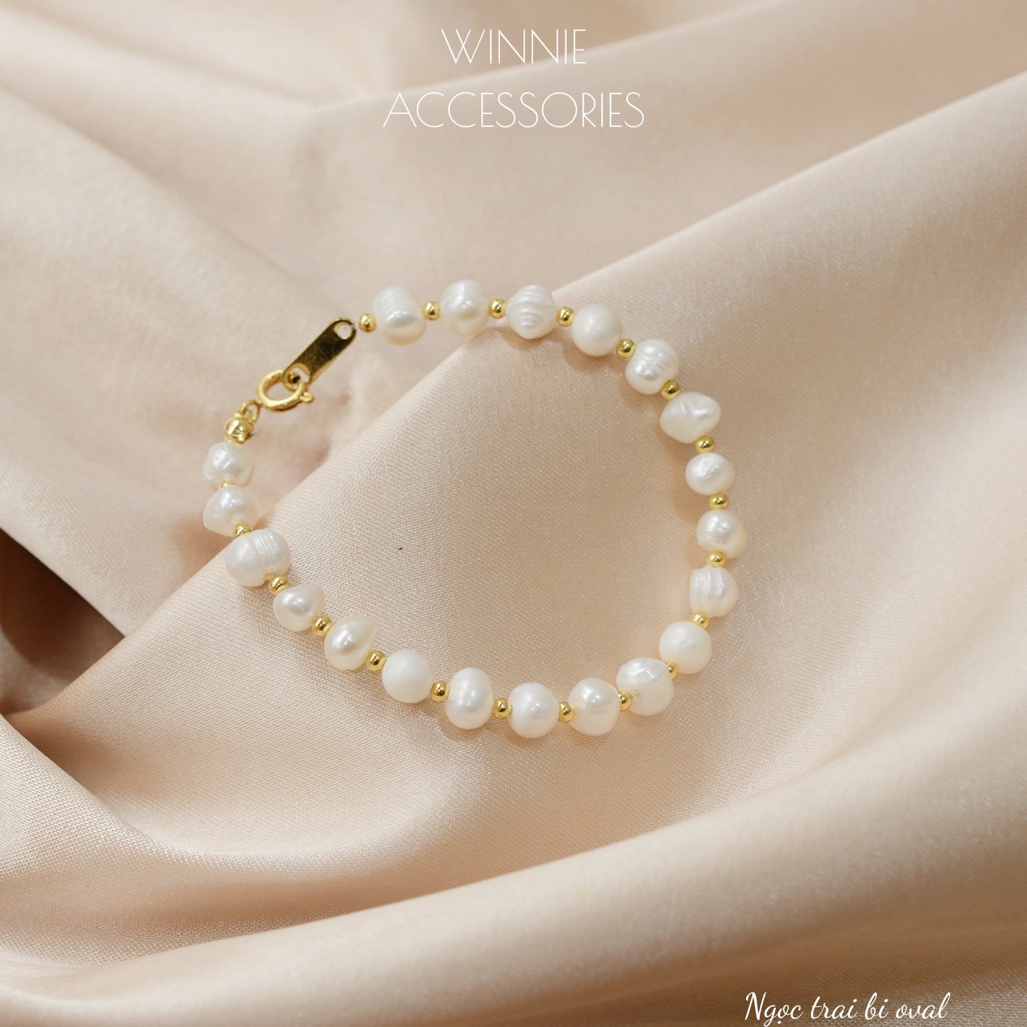  Lắc tay Titan Ngọc trai Bi Oval (ngọc trai nước ngọt) 