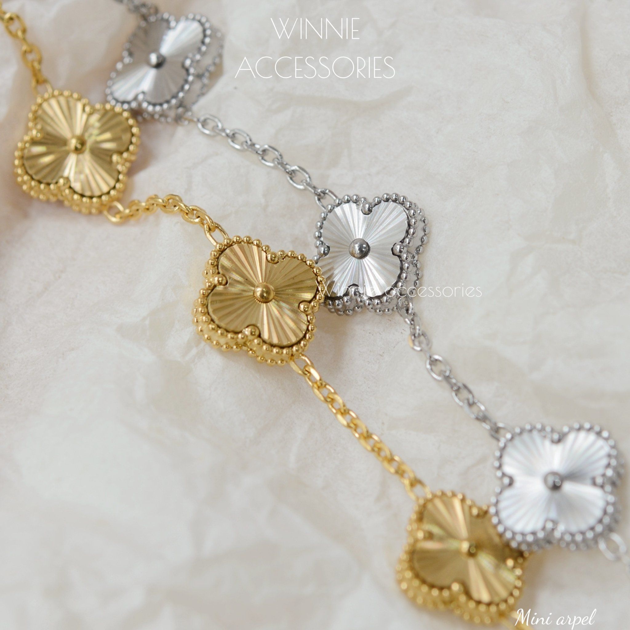  Lắc tay Titan Mini Arpel 