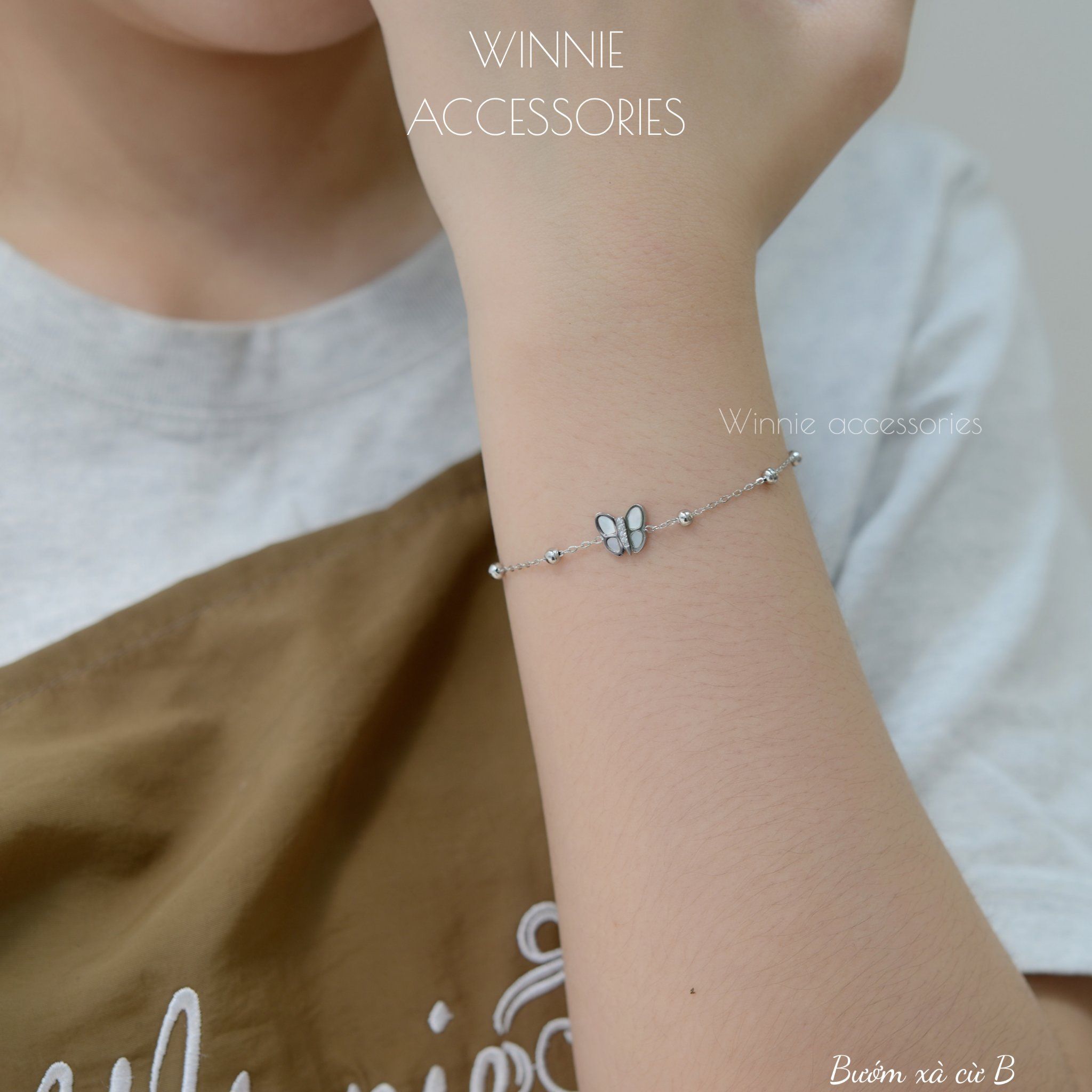  Lắc tay Titan Bướm xà cừ B 