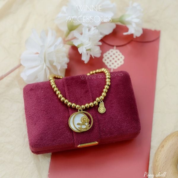  Lắc tay titan Shell Pony 