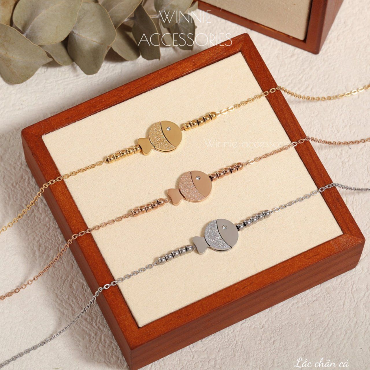  Lắc chân titan Cá 