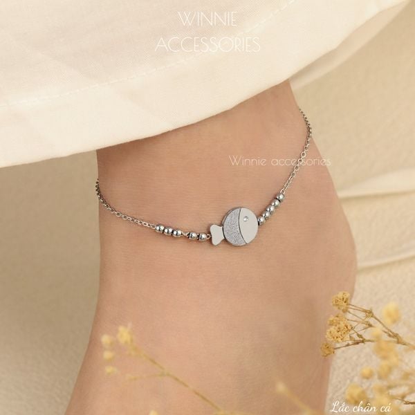  Lắc chân titan Cá 