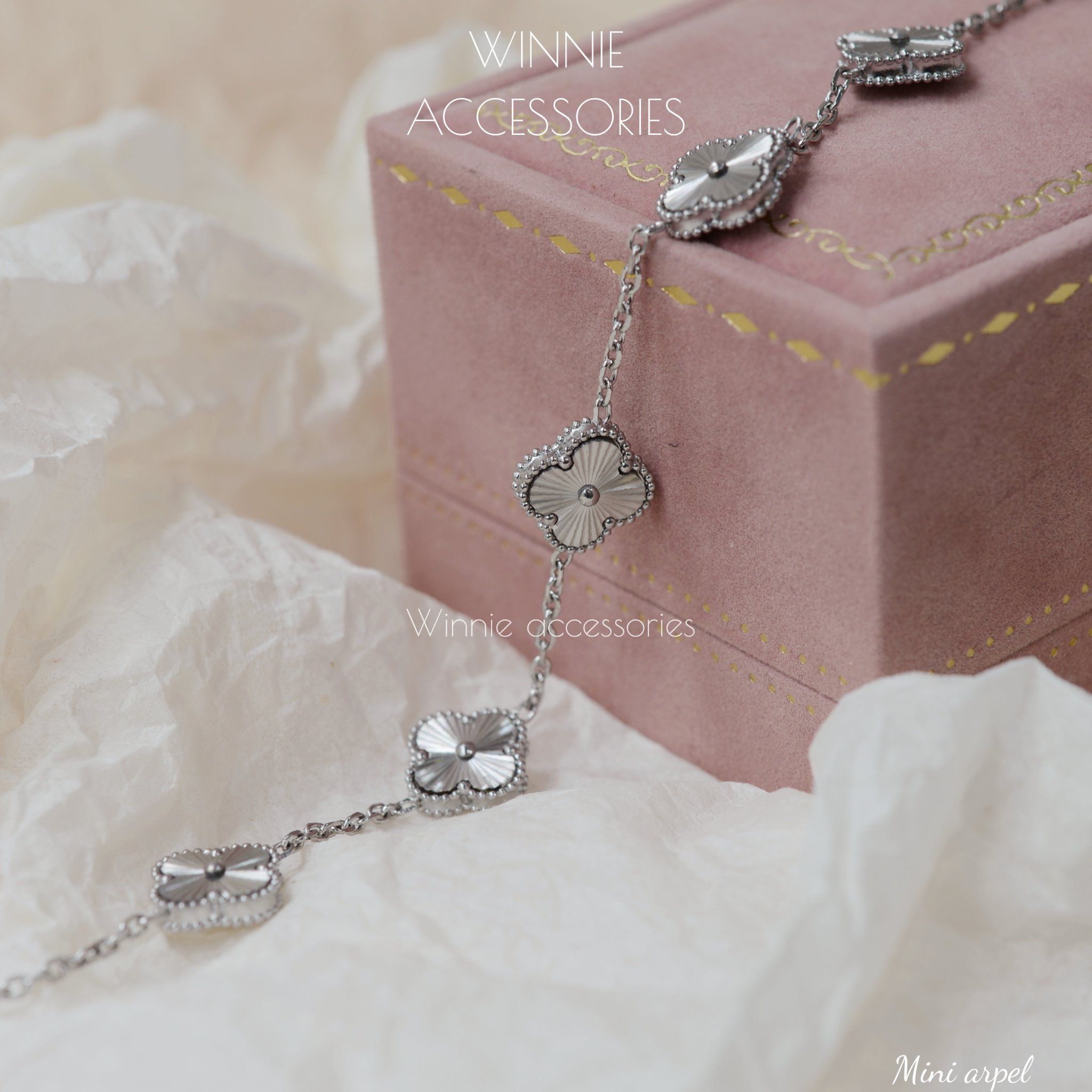  Lắc tay Titan Mini Arpel 