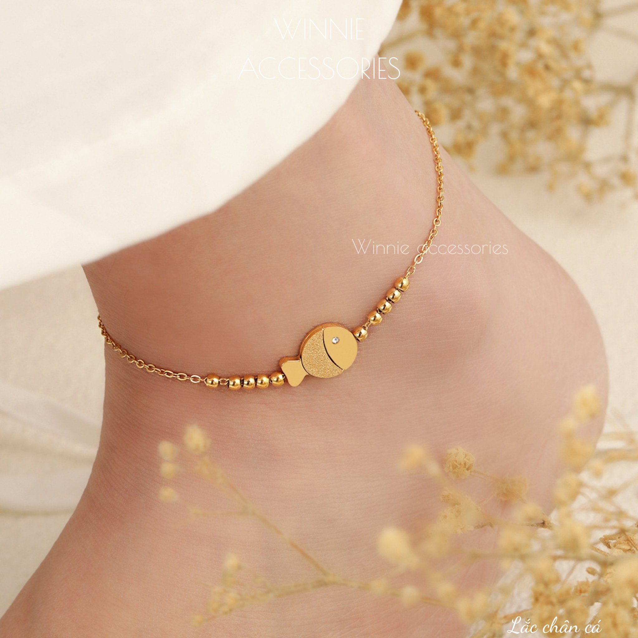  Lắc chân titan Cá 