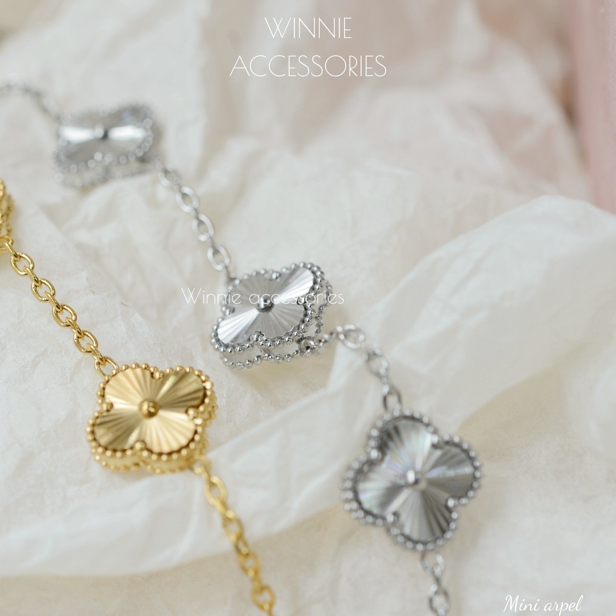  Lắc tay Titan Mini Arpel 