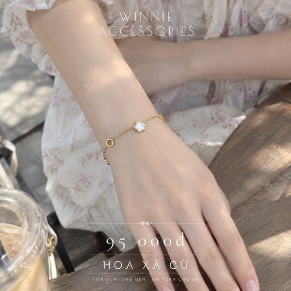  Lắc tay Titan Hoa xà cừ VG 
