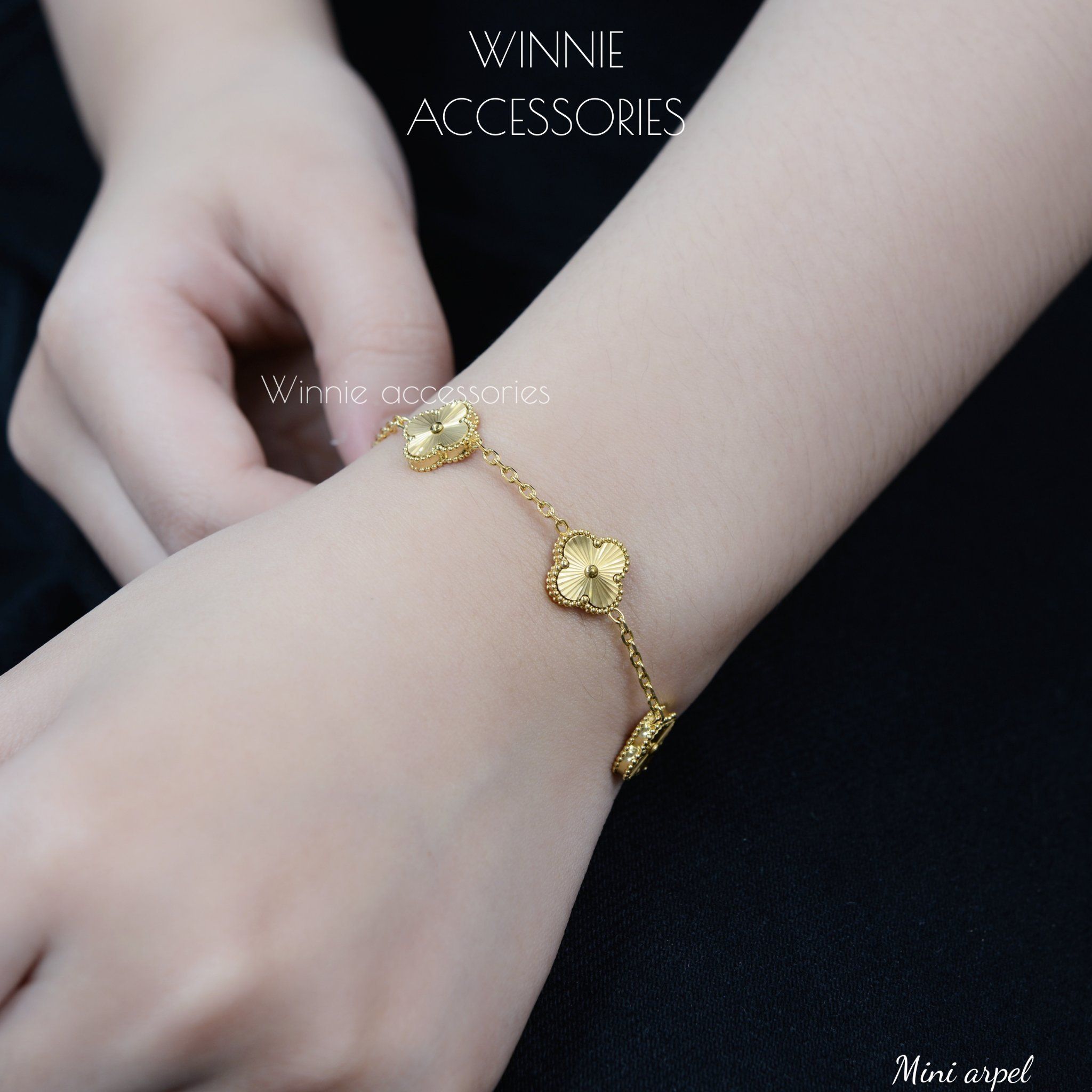  Lắc tay Titan Mini Arpel 