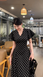 Đầm xòe cổ V chấm bi dáng midi