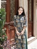 Áo dài ôm lụa in họa tiết xanh phối nơ cổ
