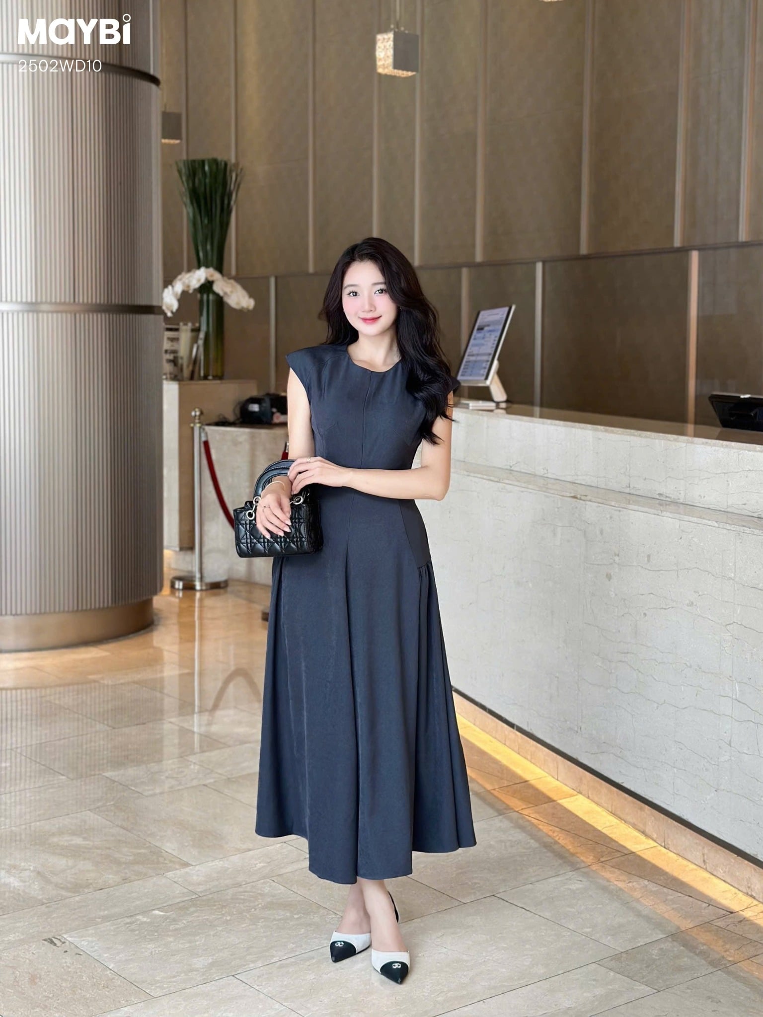 Đầm xòe chéo nhung hàn tùng rã nhún dáng midi