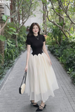 Đầm thun ôm đen tay ngắn tùng xòe dáng maxi