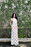 Đầm lụa chấm bi cổ yếm dáng midi