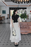 Đầm thun ôm đen tay ngắn tùng xòe dáng maxi