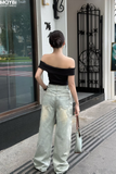 Quần jean ống suông phối nơ trang trí