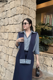 Set áo sơ mi và chân váy suông dáng midi kèm choàng cổ