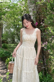 Đầm hai dây cotton thêu kem nhún xòe dáng maxi
