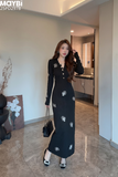 Đầm ôm dài tay gài nút