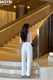 Quần kaki trắng suông thêu nơ trang trí sau