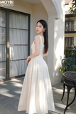 Đầm kem xòe dài nhún eo tôn dáng