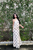 Đầm lụa chấm bi cổ yếm dáng midi