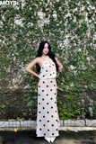 Đầm lụa chấm bi cổ yếm dáng midi