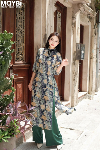 Áo dài ôm lụa in họa tiết xanh phối nơ cổ