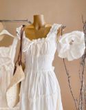 Đầm hai dây cotton thêu kem nhún xòe dáng maxi