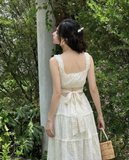 Đầm hai dây cotton thêu kem nhún xòe dáng maxi