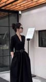 Đầm nhún xòe cổ V dài tay dáng midi