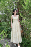 Đầm hai dây cotton thêu kem nhún xòe dáng maxi