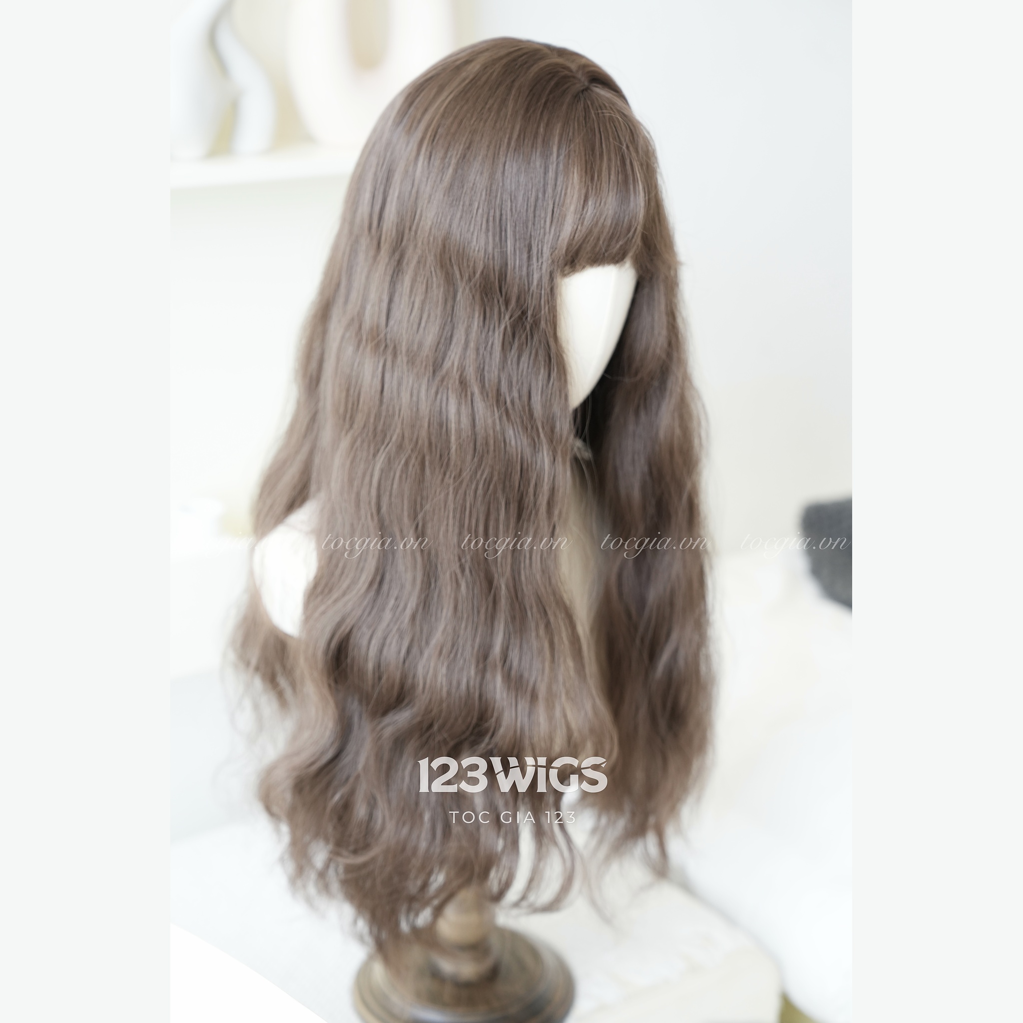 toc-gia-123-wig-xoan-song-dai-mai-thua-nau-tro-phia-sau