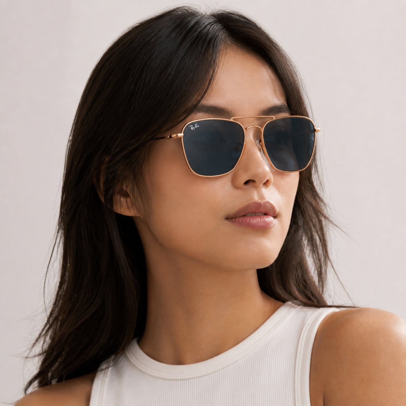 Kính mát Rayban Caravan Reverse RBR0102S 92023A - Vàng hồng bóng, tròng xanh dương đậm
