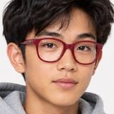 Gọng kính trẻ em Rayban Junior RY1950 7207 - Hồng cánh sen phối hồng cánh sen trong suốt – người mẫu đeo kính