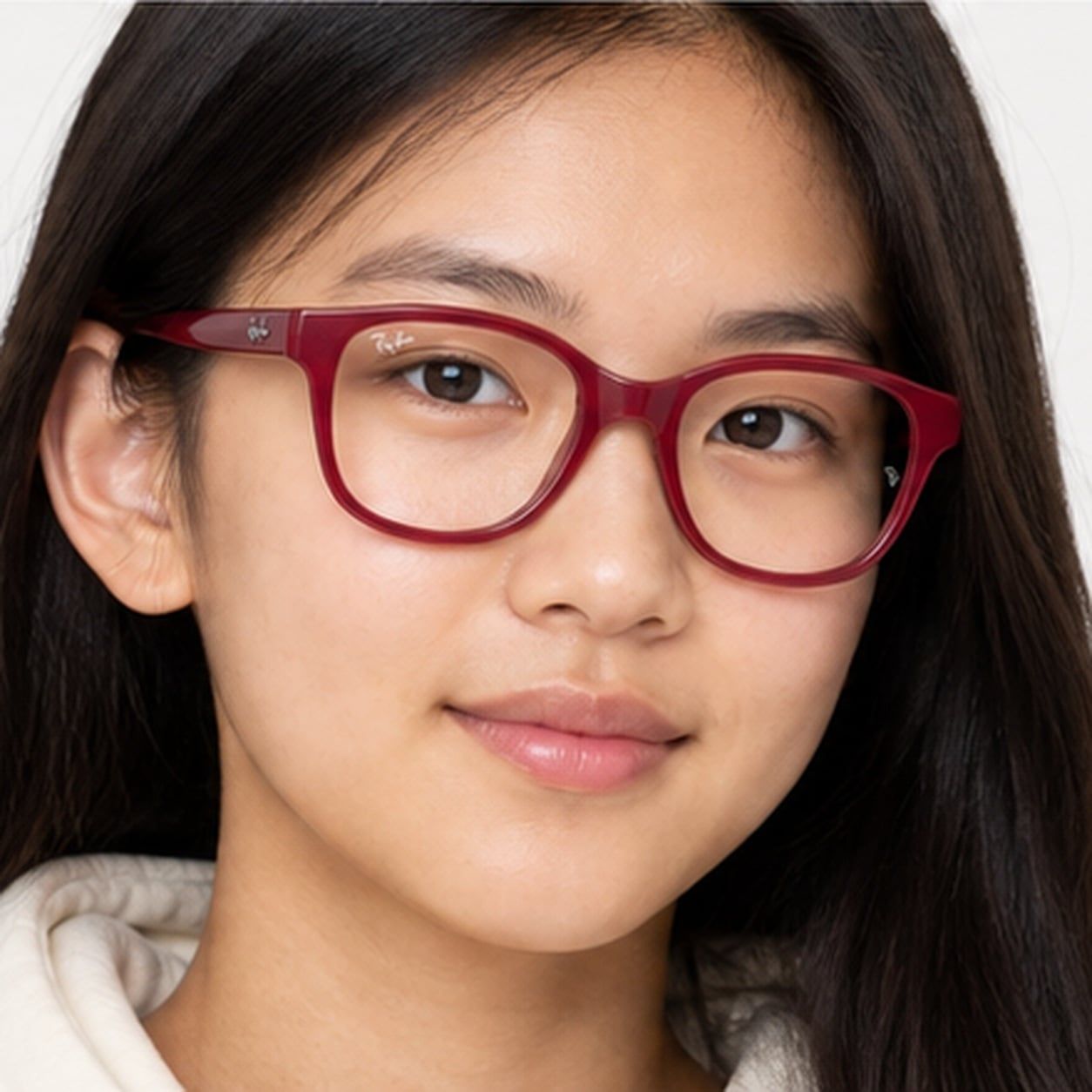 Gọng kính trẻ em Rayban Junior RY1950 7207 - Hồng cánh sen phối hồng cánh sen trong suốt – người mẫu đeo kính