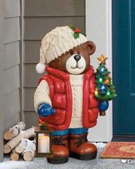 gau ong gia noel 2025 cam den va cay thong led lap lanh